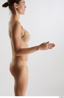 Cynthia  1 arm flexing lingerie side view underwear 0003.jpg